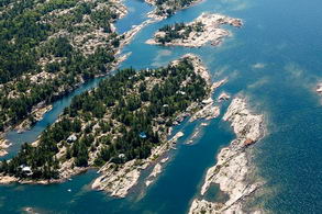 Telos Island, Snug Harbour Carling Township - Country homes for sale and luxury real estate including horse farms and property in the Caledon and King City areas near Toronto